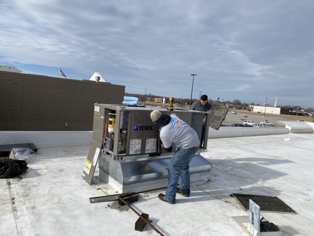 man working on a roof top