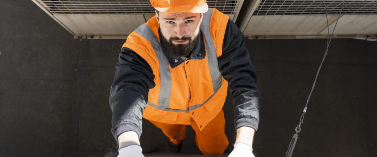 man climbing lader